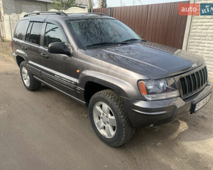 Серый Джип Гранд Чероки, объемом двигателя 2.7 л и пробегом 275 тыс. км за 10000 $, фото 1 на Automoto.ua