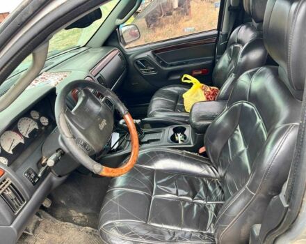 Серый Джип Гранд Чероки, объемом двигателя 2.7 л и пробегом 213 тыс. км за 6000 $, фото 5 на Automoto.ua