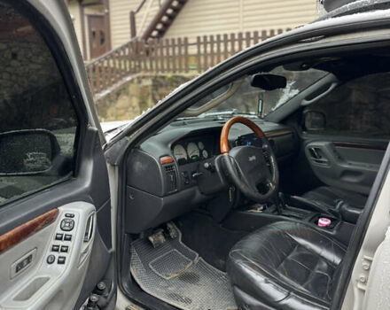 Сірий Джип Grand Cherokee, об'ємом двигуна 2.69 л та пробігом 290 тис. км за 12300 $, фото 7 на Automoto.ua