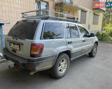 Серый Джип Гранд Чероки, объемом двигателя 2.7 л и пробегом 250 тыс. км за 5000 $, фото 3 на Automoto.ua