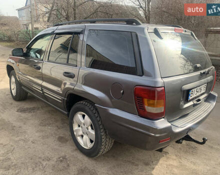 Серый Джип Гранд Чероки, объемом двигателя 2.7 л и пробегом 275 тыс. км за 10000 $, фото 3 на Automoto.ua