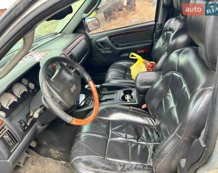 Серый Джип Гранд Чероки, объемом двигателя 2.7 л и пробегом 213 тыс. км за 6000 $, фото 4 на Automoto.ua