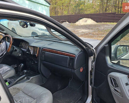 Серый Джип Гранд Чероки, объемом двигателя 2.69 л и пробегом 440 тыс. км за 5000 $, фото 6 на Automoto.ua