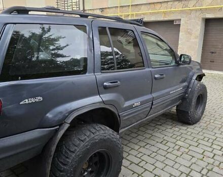 Серый Джип Гранд Чероки, объемом двигателя 4.7 л и пробегом 219 тыс. км за 9000 $, фото 5 на Automoto.ua