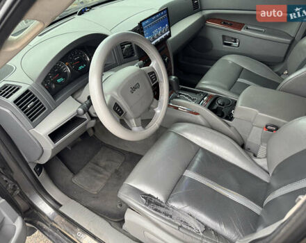 Сірий Джип Grand Cherokee, об'ємом двигуна 2.99 л та пробігом 402 тис. км за 9990 $, фото 13 на Automoto.ua