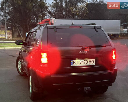 Серый Джип Гранд Чероки, объемом двигателя 3.7 л и пробегом 268 тыс. км за 6600 $, фото 60 на Automoto.ua