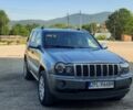 Сірий Джип Grand Cherokee, об'ємом двигуна 3 л та пробігом 412 тис. км за 7000 $, фото 1 на Automoto.ua