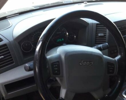 Серый Джип Гранд Чероки, объемом двигателя 5.65 л и пробегом 171 тыс. км за 10800 $, фото 10 на Automoto.ua