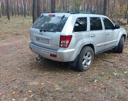 Серый Джип Гранд Чероки, объемом двигателя 5.65 л и пробегом 171 тыс. км за 10800 $, фото 1 на Automoto.ua