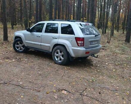 Серый Джип Гранд Чероки, объемом двигателя 5.65 л и пробегом 171 тыс. км за 10800 $, фото 2 на Automoto.ua