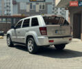 Сірий Джип Grand Cherokee, об'ємом двигуна 5.65 л та пробігом 242 тис. км за 9000 $, фото 3 на Automoto.ua