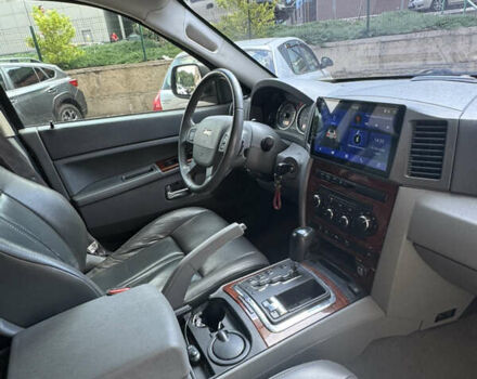 Сірий Джип Grand Cherokee, об'ємом двигуна 5.65 л та пробігом 242 тис. км за 9000 $, фото 7 на Automoto.ua