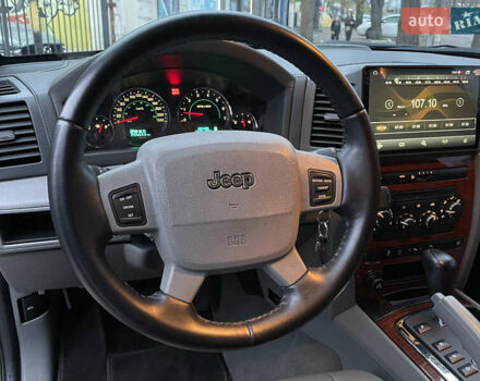 Сірий Джип Grand Cherokee, об'ємом двигуна 5.7 л та пробігом 205 тис. км за 11999 $, фото 13 на Automoto.ua