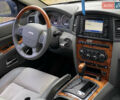 Джип Grand Cherokee 2006 у Житомирі на Automoto.ua Сірий Джип Grand Cherokee, об'ємом двигуна 3 л та пробігом 243 тис. км за 9999 $, фото 3 на Automoto.ua