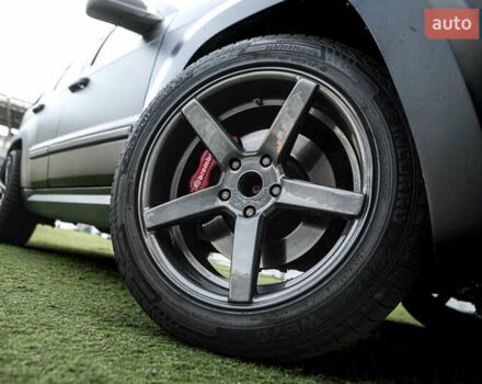 Серый Джип Гранд Чероки, объемом двигателя 6.06 л и пробегом 154 тыс. км за 15900 $, фото 5 на Automoto.ua