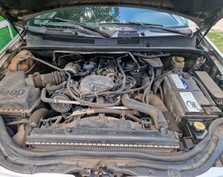 Сірий Джип Grand Cherokee, об'ємом двигуна 3 л та пробігом 100 тис. км за 4835 $, фото 2 на Automoto.ua