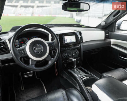 Серый Джип Гранд Чероки, объемом двигателя 6.06 л и пробегом 154 тыс. км за 14900 $, фото 29 на Automoto.ua