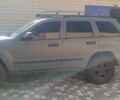 Сірий Джип Grand Cherokee, об'ємом двигуна 2.99 л та пробігом 317 тис. км за 12000 $, фото 1 на Automoto.ua
