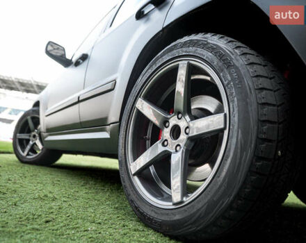 Серый Джип Гранд Чероки, объемом двигателя 6.06 л и пробегом 154 тыс. км за 14900 $, фото 64 на Automoto.ua