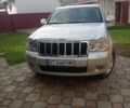 Серый Джип Гранд Чероки, объемом двигателя 2.99 л и пробегом 233 тыс. км за 11000 $, фото 1 на Automoto.ua