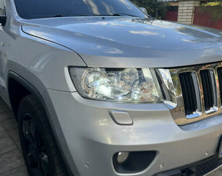 Сірий Джип Grand Cherokee, об'ємом двигуна 3 л та пробігом 196 тис. км за 15500 $, фото 4 на Automoto.ua