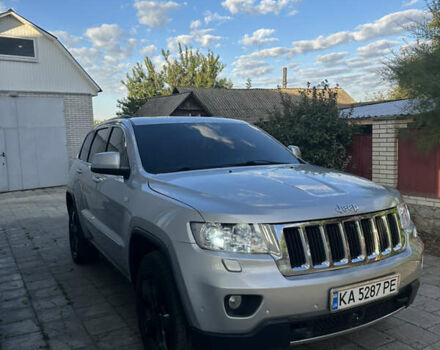 Сірий Джип Grand Cherokee, об'ємом двигуна 3 л та пробігом 196 тис. км за 15500 $, фото 2 на Automoto.ua