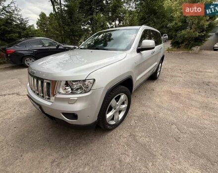 Сірий Джип Grand Cherokee, об'ємом двигуна 3 л та пробігом 205 тис. км за 13500 $, фото 1 на Automoto.ua