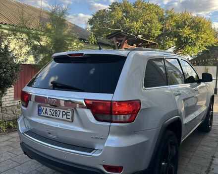 Сірий Джип Grand Cherokee, об'ємом двигуна 3 л та пробігом 196 тис. км за 15500 $, фото 5 на Automoto.ua