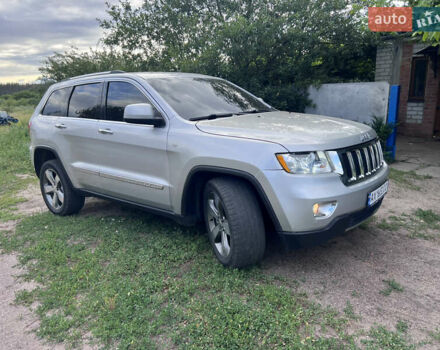 Сірий Джип Grand Cherokee, об'ємом двигуна 2.99 л та пробігом 210 тис. км за 15999 $, фото 1 на Automoto.ua