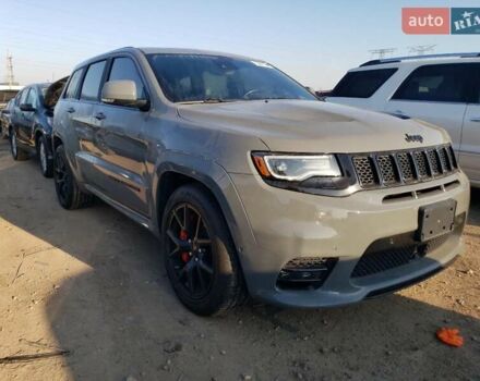 Сірий Джип Grand Cherokee, об'ємом двигуна 6.4 л та пробігом 16 тис. км за 23000 $, фото 4 на Automoto.ua
