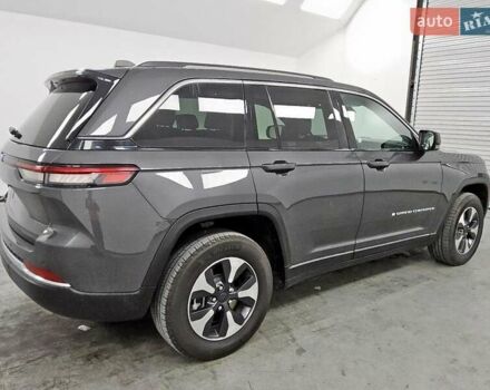 Серый Джип Гранд Чероки, объемом двигателя 2 л и пробегом 87 тыс. км за 14850 $, фото 2 на Automoto.ua