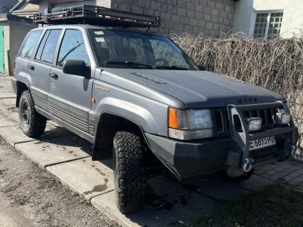 Сірий Джип Grand Cherokee, об'ємом двигуна 0.52 л та пробігом 300 тис. км за 7000 $, фото 1 на Automoto.ua