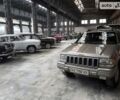 Сірий Джип Grand Cherokee, об'ємом двигуна 5.2 л та пробігом 385 тис. км за 5500 $, фото 1 на Automoto.ua