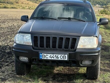 Сірий Джип Grand Cherokee, об'ємом двигуна 3.12 л та пробігом 240 тис. км за 6000 $, фото 1 на Automoto.ua