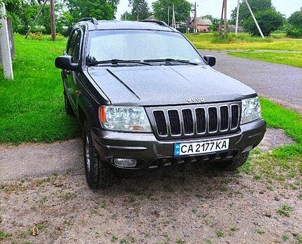 Сірий Джип Grand Cherokee, об'ємом двигуна 4.7 л та пробігом 393 тис. км за 7500 $, фото 1 на Automoto.ua