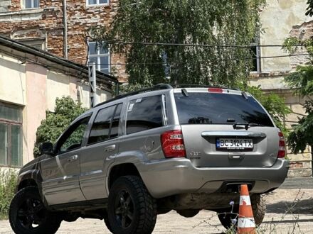 Сірий Джип Grand Cherokee, об'ємом двигуна 4.7 л та пробігом 200 тис. км за 7494 $, фото 1 на Automoto.ua