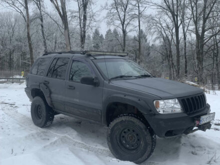 Сірий Джип Grand Cherokee, об'ємом двигуна 4.7 л та пробігом 300 тис. км за 9500 $, фото 1 на Automoto.ua