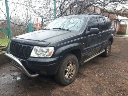 Серый Джип Гранд Чероки, объемом двигателя 3 л и пробегом 300 тыс. км за 2200 $, фото 1 на Automoto.ua