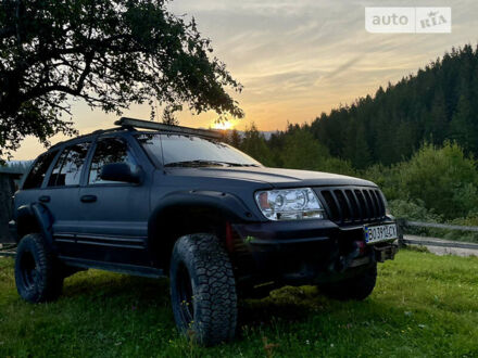 Сірий Джип Grand Cherokee, об'ємом двигуна 4.7 л та пробігом 400 тис. км за 8000 $, фото 1 на Automoto.ua