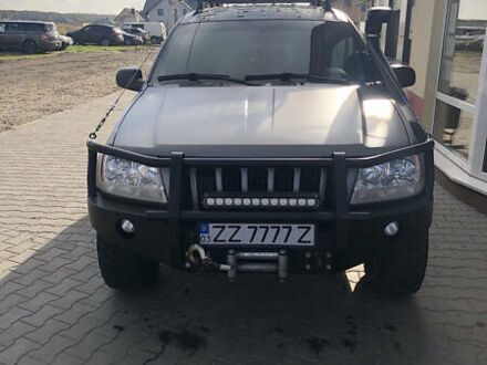 Сірий Джип Grand Cherokee, об'ємом двигуна 4.7 л та пробігом 244 тис. км за 13500 $, фото 1 на Automoto.ua