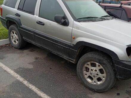 Серый Джип Гранд Чероки, объемом двигателя 3 л и пробегом 350 тыс. км за 1800 $, фото 1 на Automoto.ua