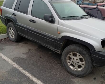 Сірий Джип Grand Cherokee, об'ємом двигуна 3 л та пробігом 350 тис. км за 1800 $, фото 1 на Automoto.ua