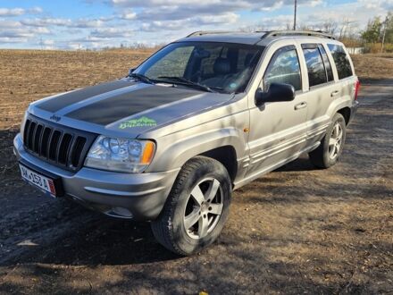 Серый Джип Гранд Чероки, объемом двигателя 3.1 л и пробегом 220 тыс. км за 2500 $, фото 1 на Automoto.ua