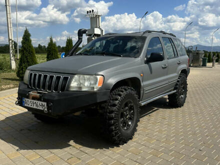 Сірий Джип Grand Cherokee, об'ємом двигуна 2.69 л та пробігом 250 тис. км за 9000 $, фото 1 на Automoto.ua