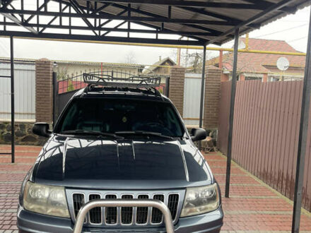 Серый Джип Гранд Чероки, объемом двигателя 2.7 л и пробегом 231 тыс. км за 9500 $, фото 1 на Automoto.ua