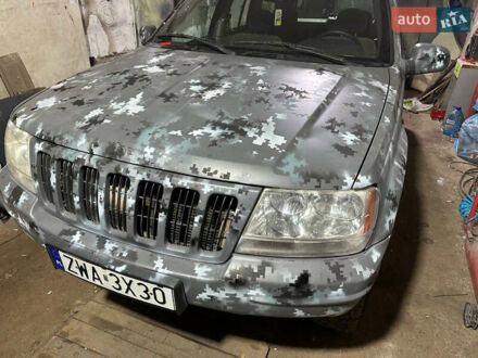 Сірий Джип Grand Cherokee, об'ємом двигуна 3.12 л та пробігом 247 тис. км за 4200 $, фото 1 на Automoto.ua