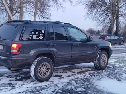 Серый Джип Гранд Чероки, объемом двигателя 2.7 л и пробегом 321 тыс. км за 4200 $, фото 1 на Automoto.ua