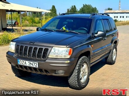Джип Grand Cherokee 2002 у Краматорске на Automoto.ua Сірий Джип Grand Cherokee, об'ємом двигуна 3.1 л та пробігом 243 тис. км за 4321 $, фото 1 на Automoto.ua