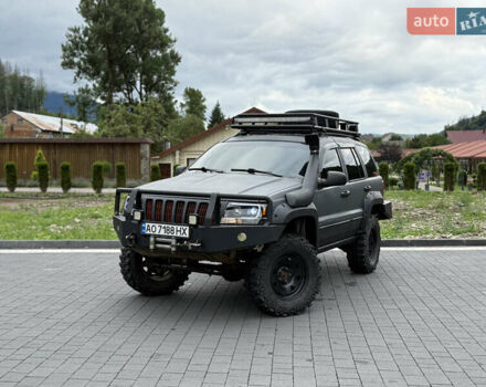 Сірий Джип Grand Cherokee, об'ємом двигуна 3.96 л та пробігом 166 тис. км за 10800 $, фото 1 на Automoto.ua