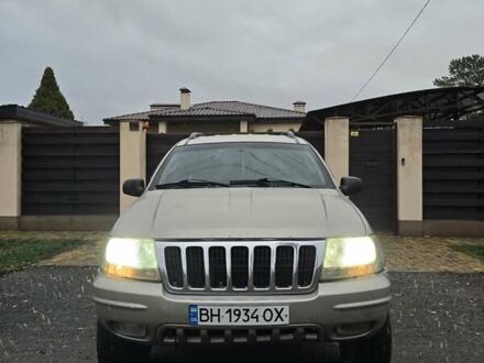 Серый Джип Гранд Чероки, объемом двигателя 2.69 л и пробегом 300 тыс. км за 6000 $, фото 1 на Automoto.ua